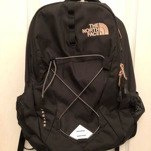 Black and Rose Gold North Face backpack